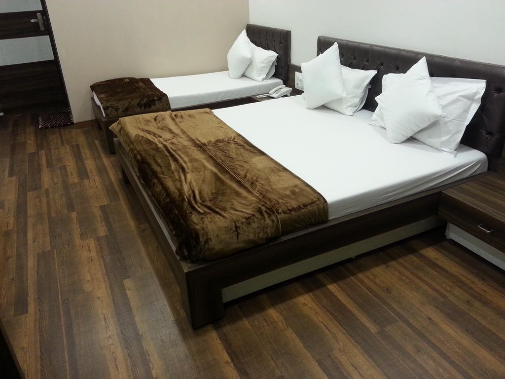 Hotel Oasis Mumbai Rom bilde