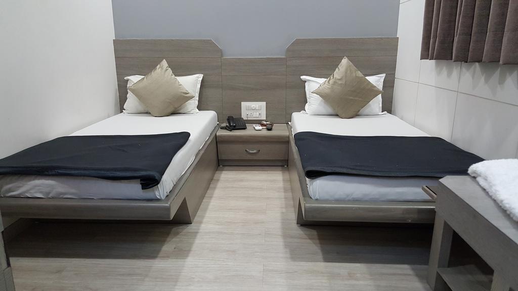 Hotel Oasis Mumbai Rom bilde