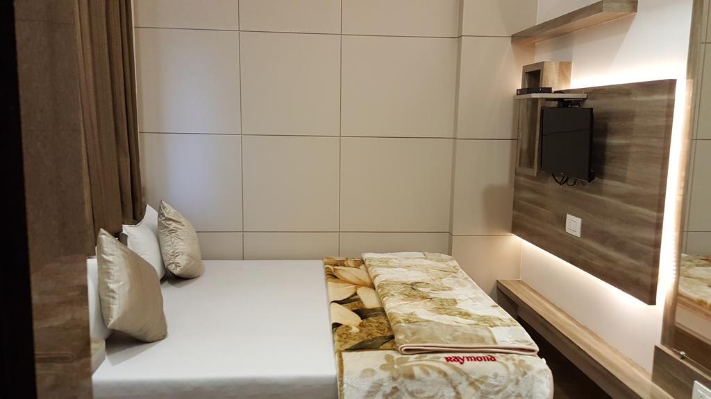Hotel Oasis Mumbai Rom bilde